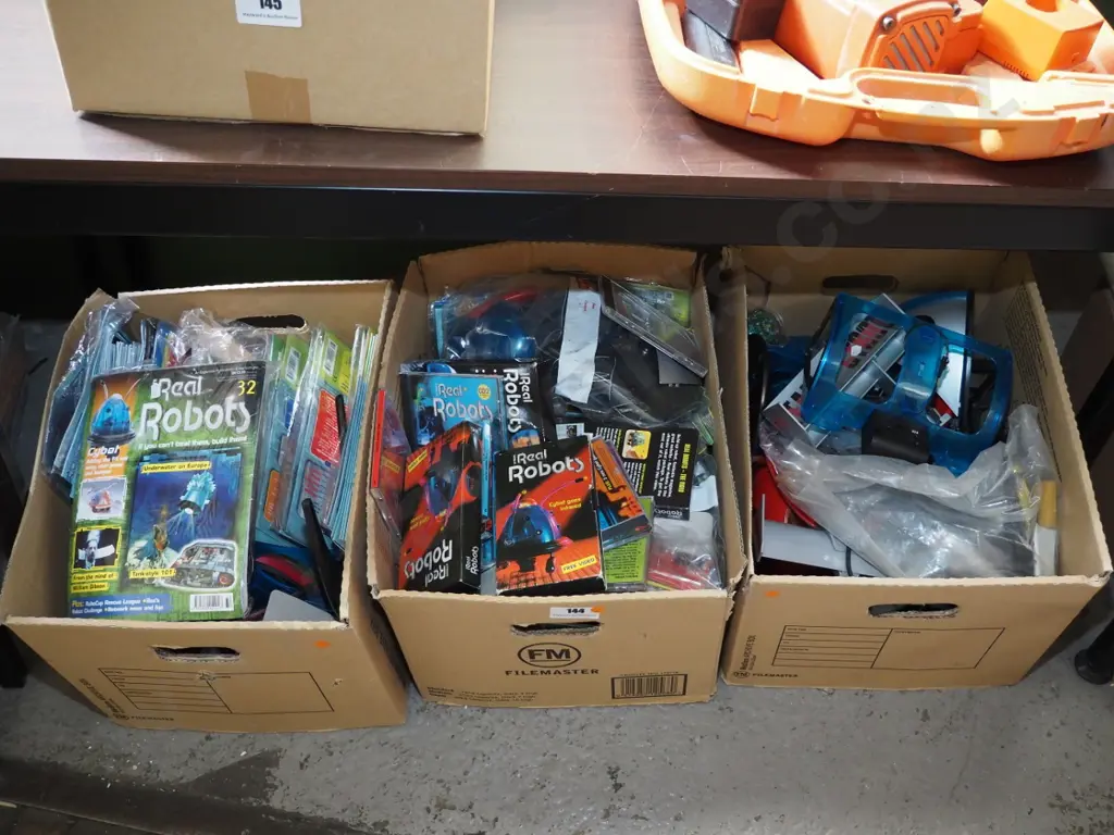 3 boxes of Real Robots - parts, accessories, magazines - orange dots Image 1++