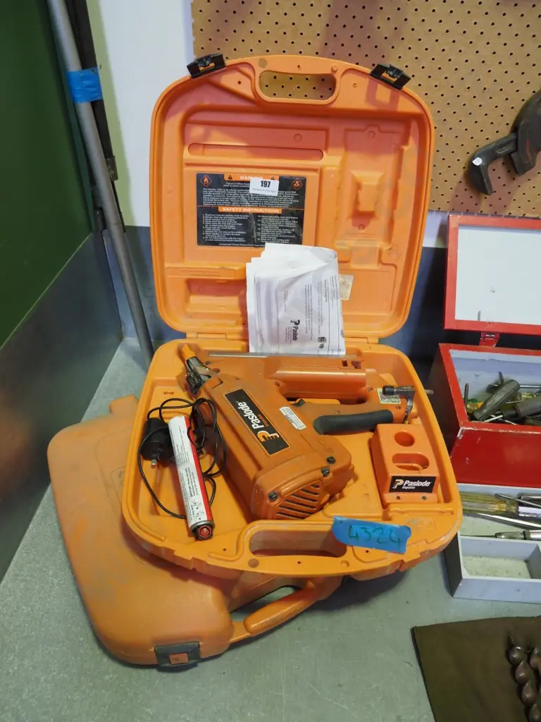 2 cased Paslode nail guns - missing batteries - As Is, No Returns Image 1++
