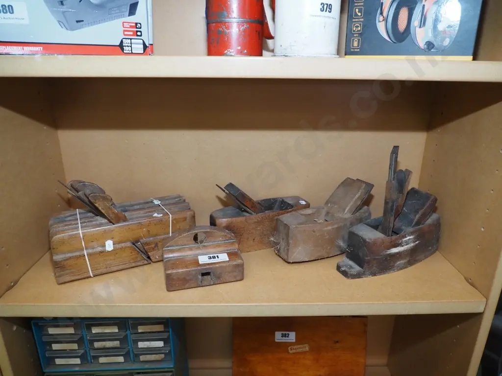 shelf of vintage hand planes Image 1++