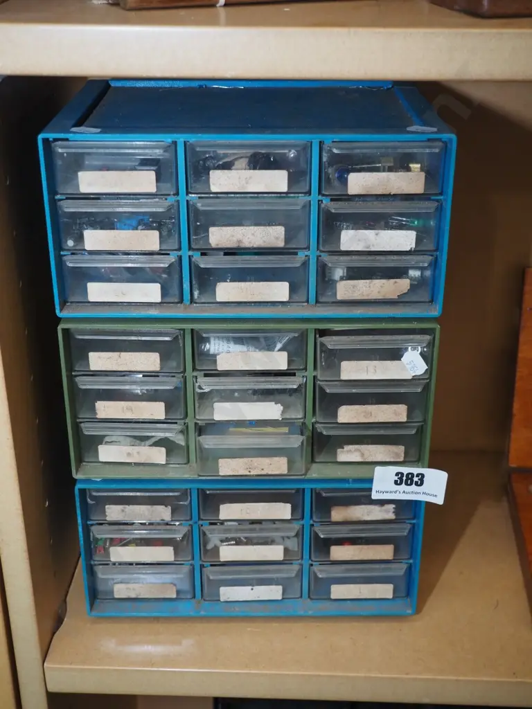 plastic storage box with drawers filled with electrical allsorts Image 1++