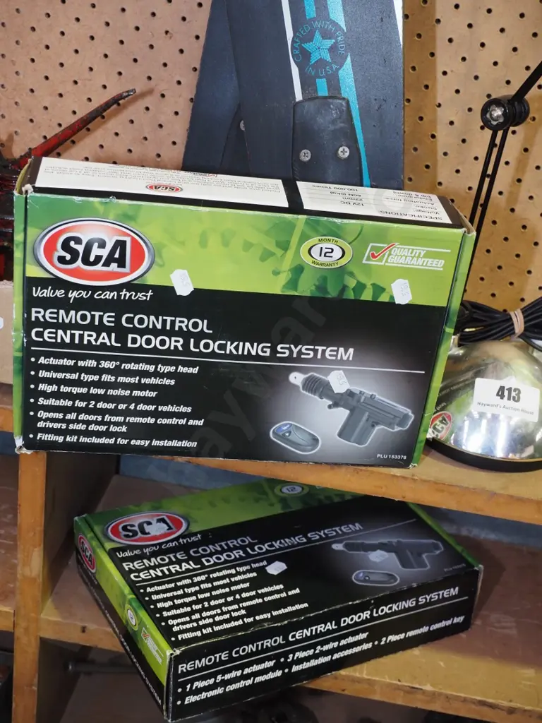 2 boxed remote control central door locking systems Image 1++