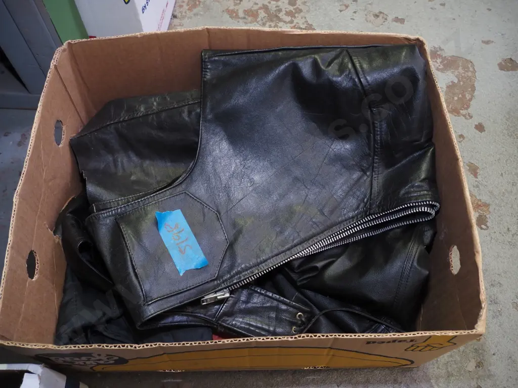 box; motorcycle leathers, pants, vest, chaps Image 1++