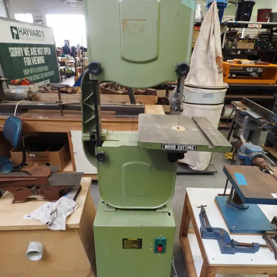unbranded band saw on stand