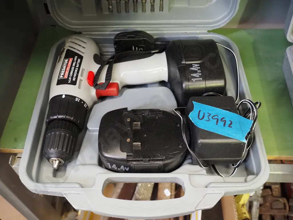 cased Predator battery drill Image 1++
