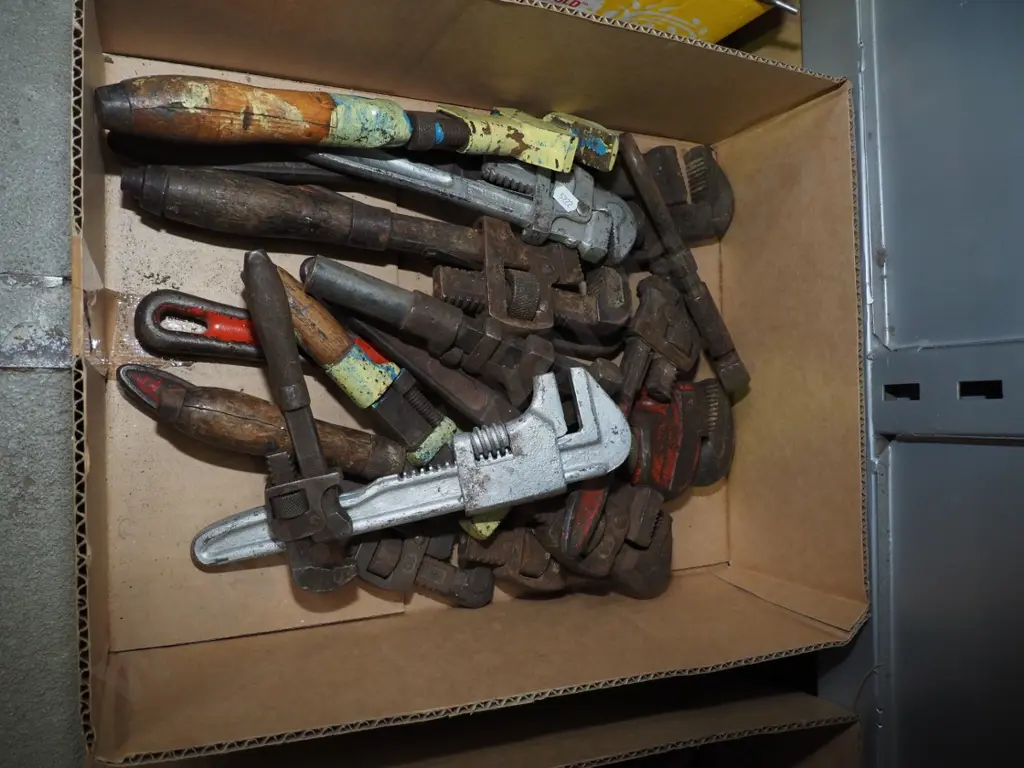 box of plumber's stilsons Image 1++