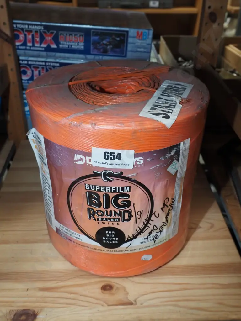 roll of orange baler twine Image 1++