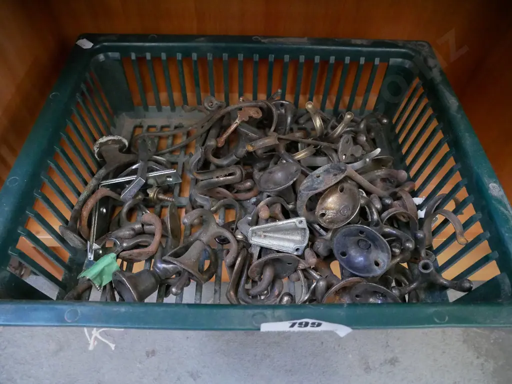 plastic tub of wardrobe hooks Image 1++