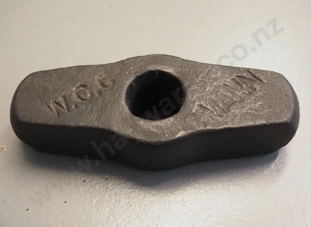 vintage cast iron and wood forge hammer L-360 and 2 heads without handles, one marked "WCC" & "Mann" Image 1++