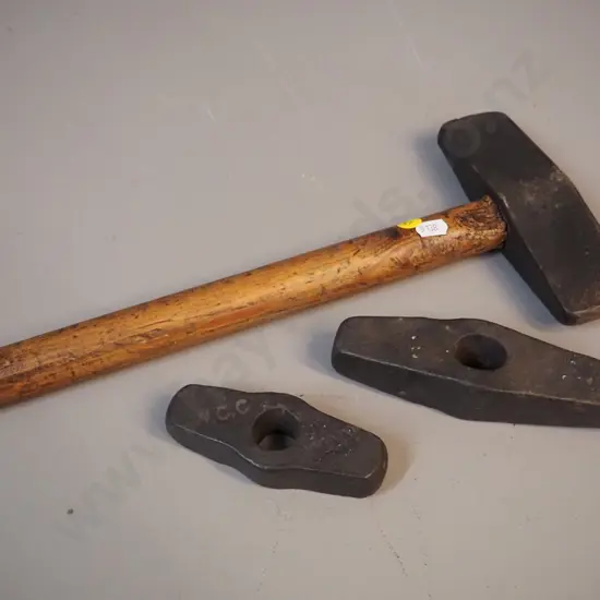 vintage cast iron and wood forge hammer L-360 and 2 heads without handles, one marked "WCC" & "Mann"