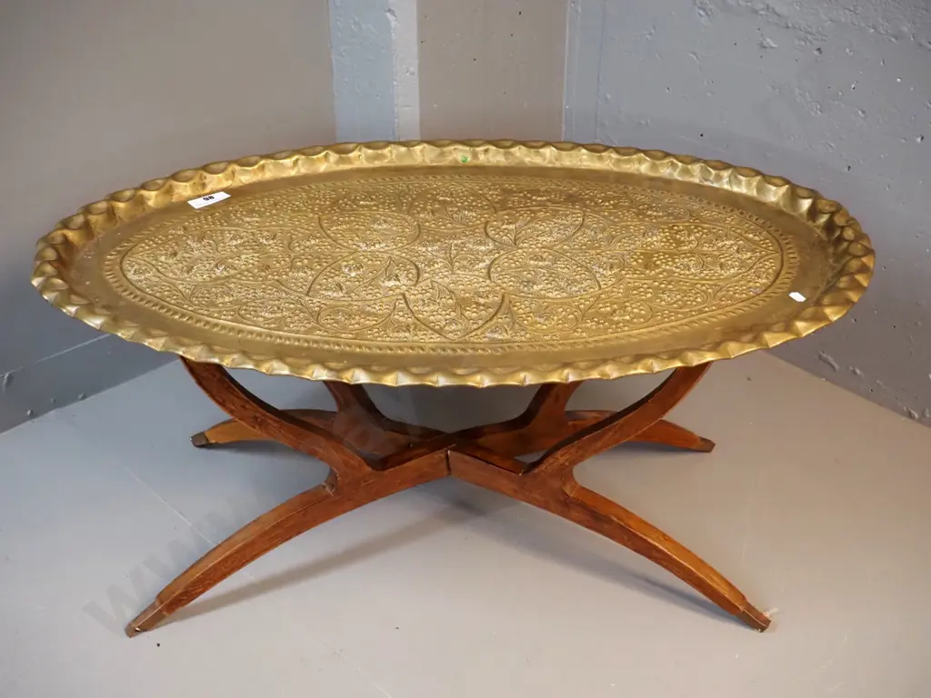 beaten brass tray / table with grape motifs on folding timber base - H-420 L-930 W-560 Image 1++