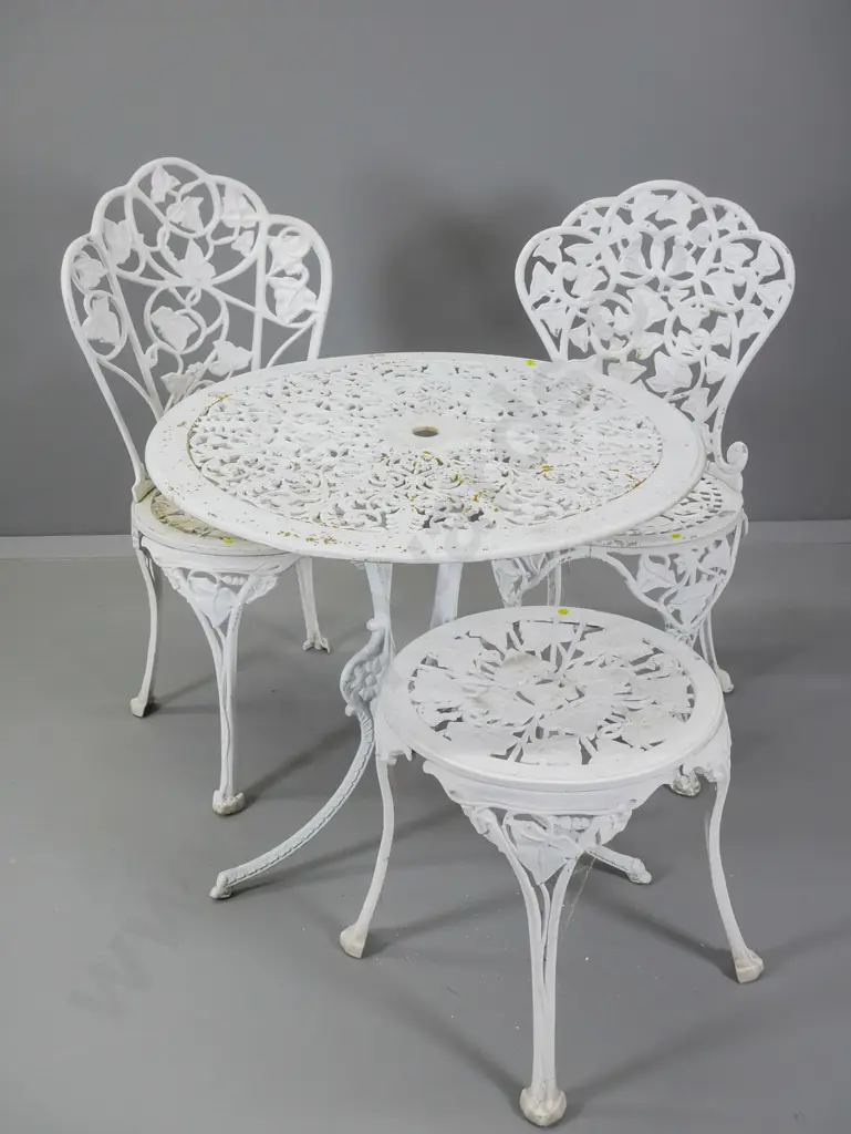 4 pieces vintage white painted cast aluminium outdoor furniture: table D700, stool, 2 chairs, some weathering Image 1++