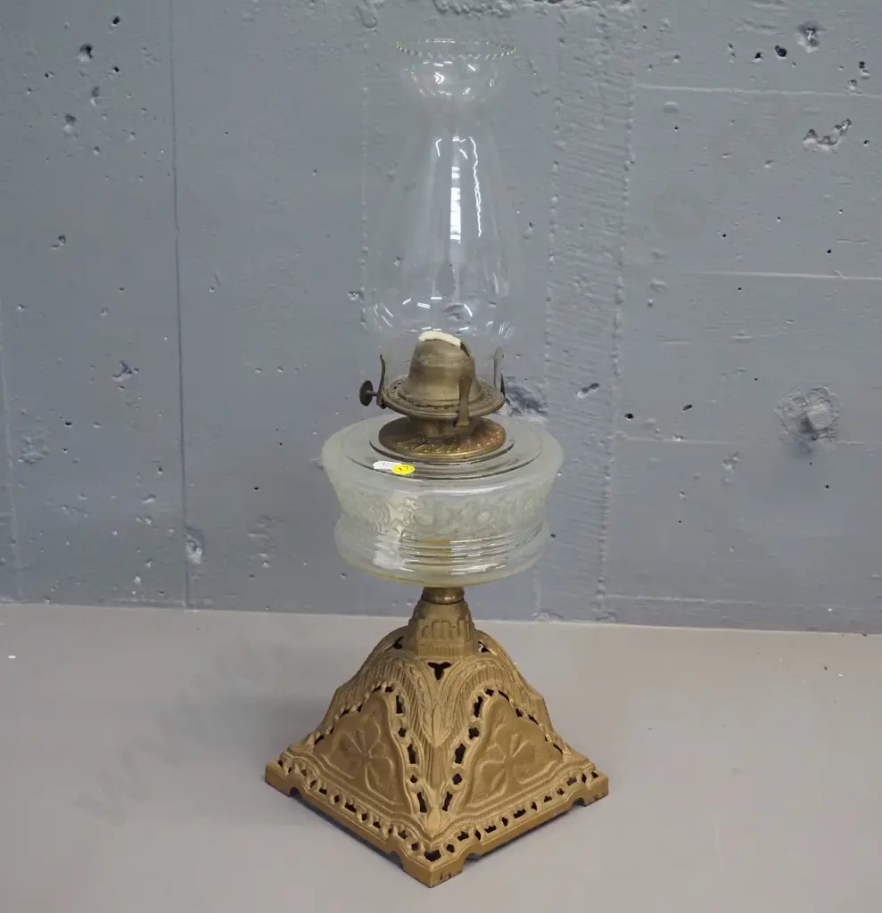 gold-finish metal based kerosene lamp with clear moulded glass tank, with chimney Image 1++