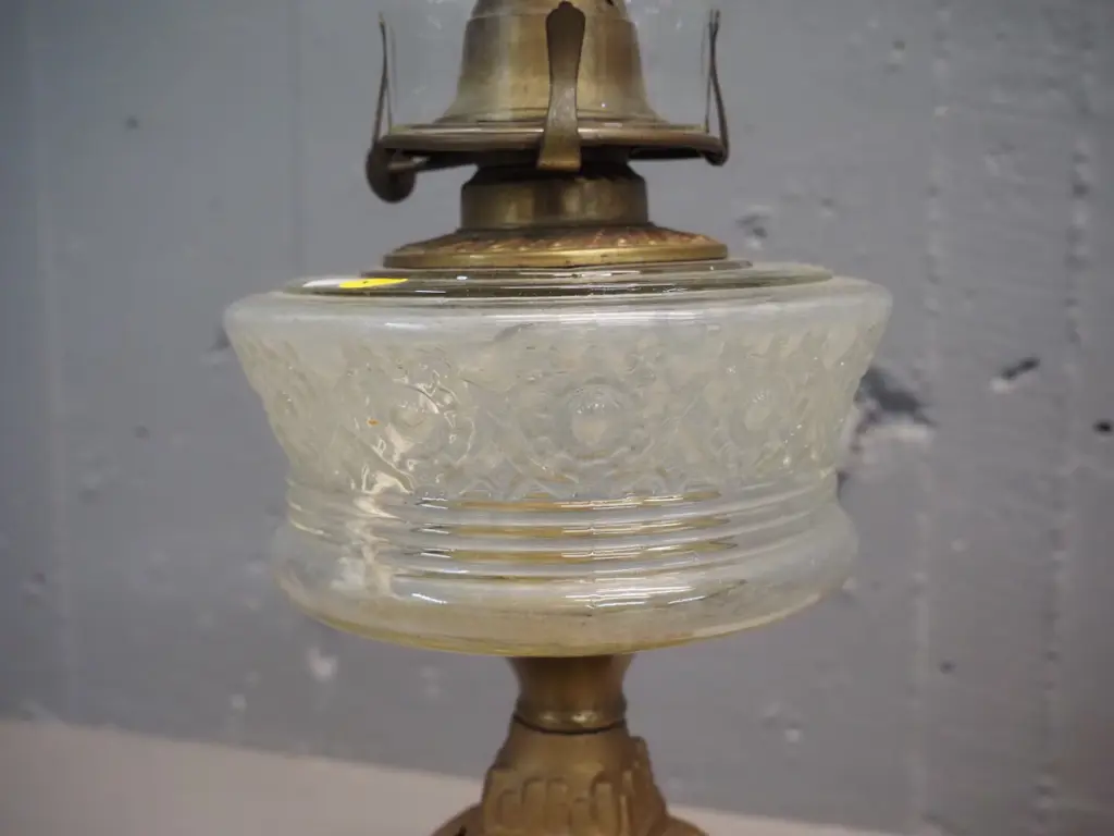 gold-finish metal based kerosene lamp with clear moulded glass tank, with chimney Image 1++