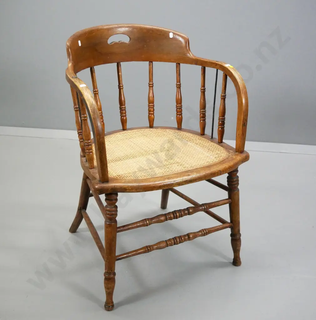vintage oak captain's chair with woven rattan seat, spindle back, small repair on front H-780 W-530 D-500 Image 1++