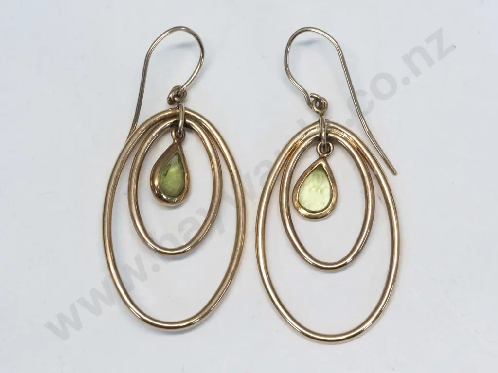 pair of peridot earrings stamped Image 1++