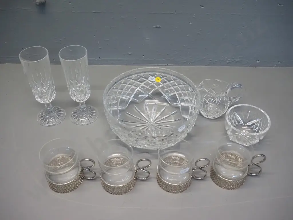 4 Iittala Finland tea cups with metal holders, 2 champagne flutes, and a cut crystal salad bowl, cream & sugar Image 1++