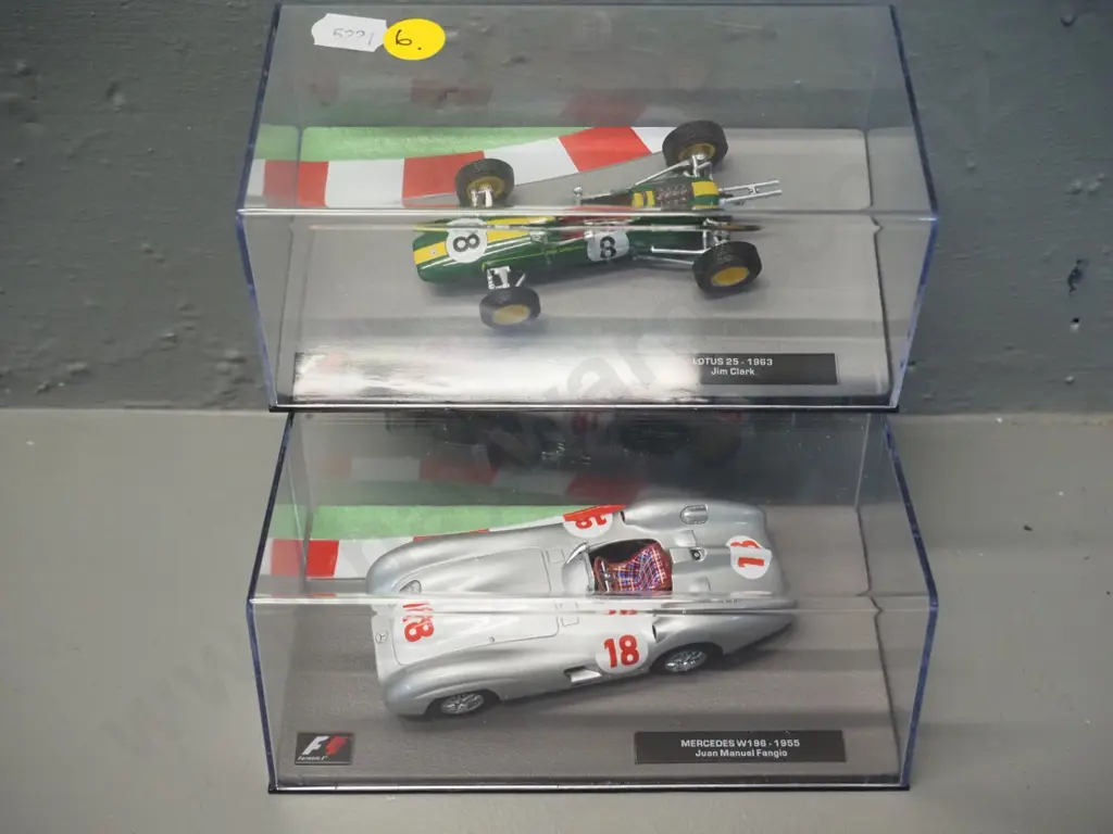 2 die-cast 1:43 scale Formula 1 racing cars - 1955 Juan Manuel Fangio and 1963 Jim Clarke Image 1++