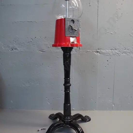 Carousel brand gum-ball dispenser on cast metal stand - H950 W450 - supplied bolts don't fit into