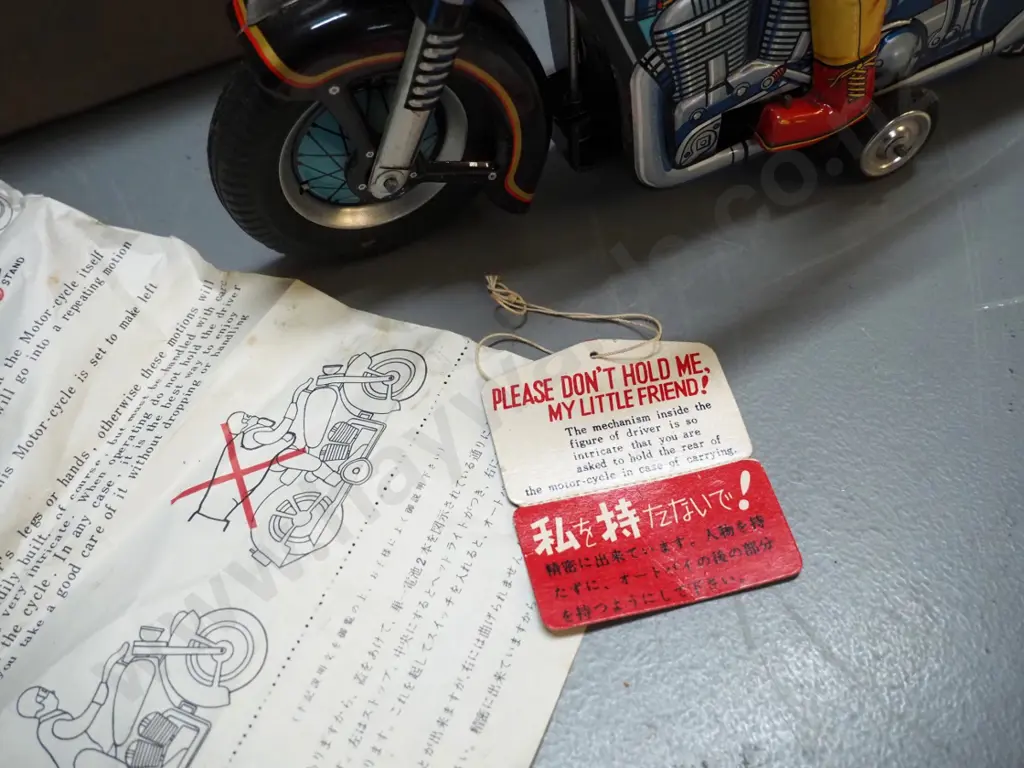 Japanese tin toy "Expert Motorcyclist" battery powered toy - with box tag and instructions - VG condition but untested Image 1++