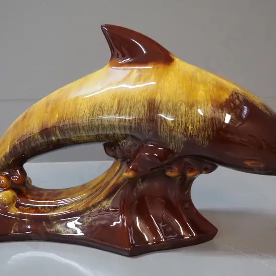 Blue Mountain pottery gold and brown large dolphin H-250 L-420
