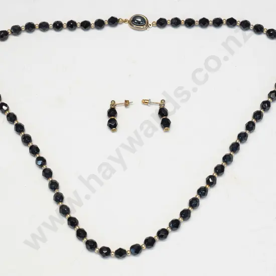 black bead necklace and matching earrings