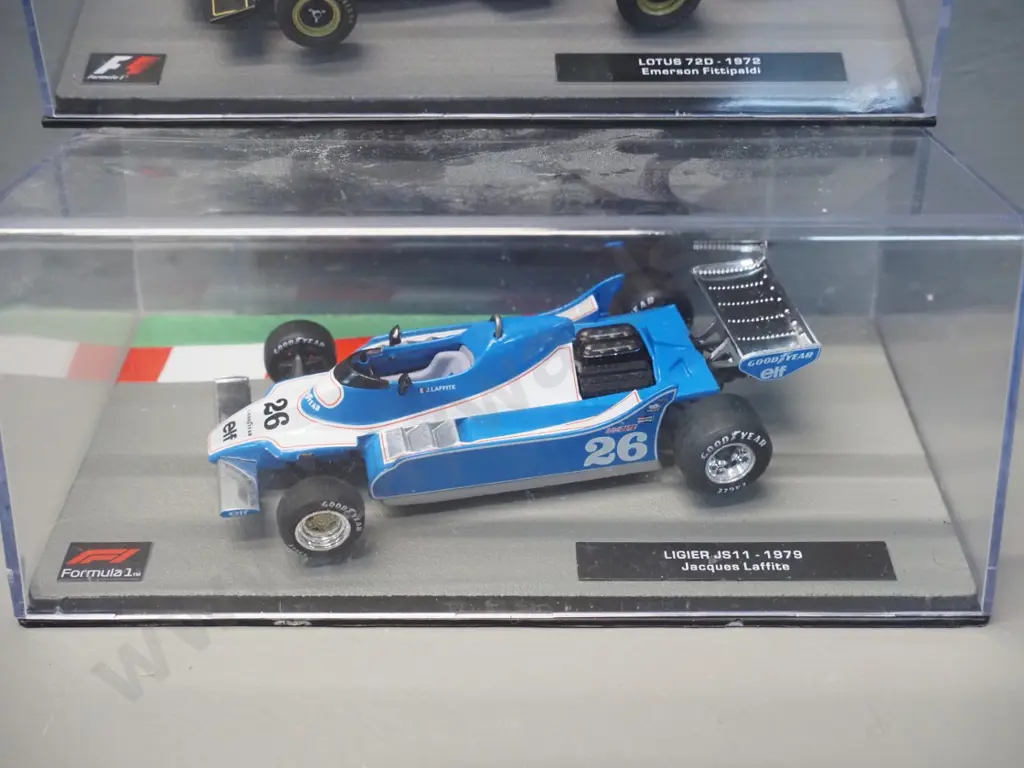 2 die-cast 1:43 scale Formula 1 racing cars - 1972 Emerson Fittipaldi and 1979 Jacques Laffite Image 1++