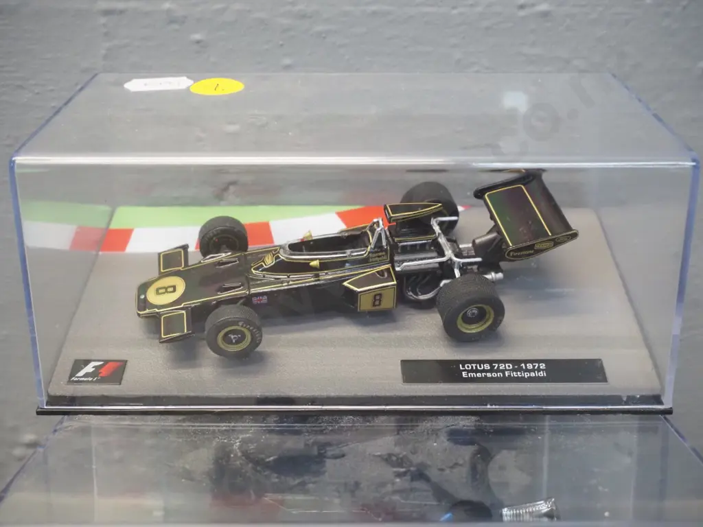 2 die-cast 1:43 scale Formula 1 racing cars - 1972 Emerson Fittipaldi and 1979 Jacques Laffite Image 1++