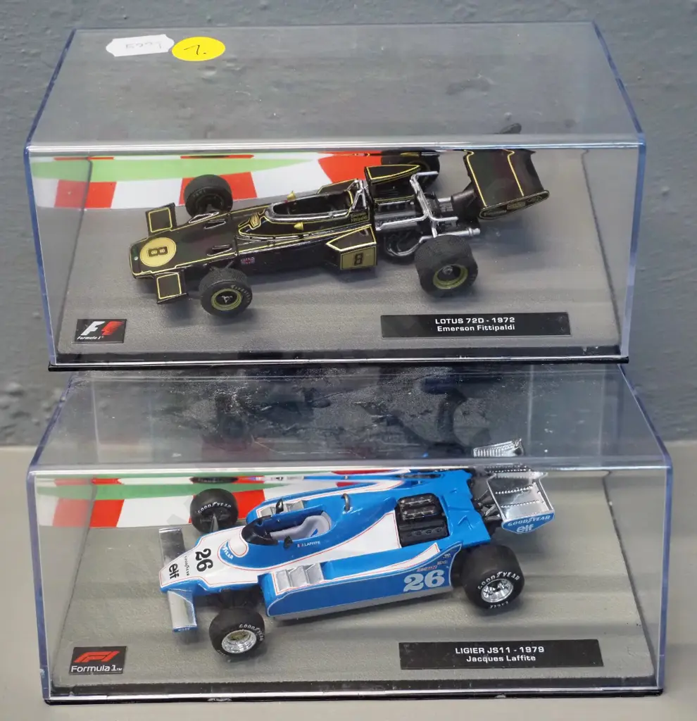 2 die-cast 1:43 scale Formula 1 racing cars - 1972 Emerson Fittipaldi and 1979 Jacques Laffite Image 1++