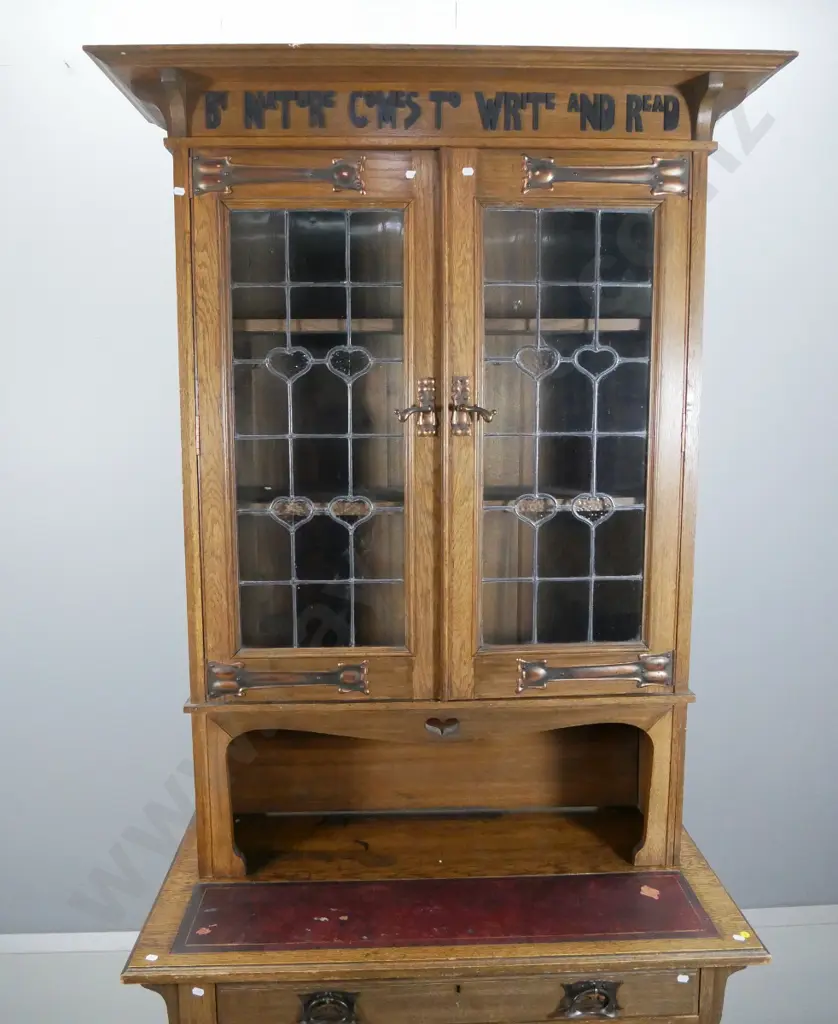 Arts & crafts oak writing desk w/glazed bookcase top w/copper handles & strap hinges, applique timber motto, Image 1++