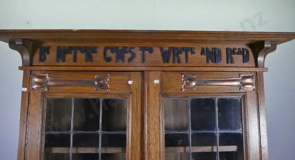 Arts & crafts oak writing desk w/glazed bookcase top w/copper handles & strap hinges, applique timber motto, Image 1++