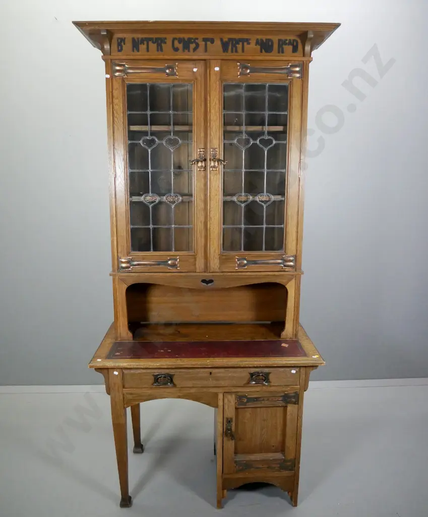 Arts & crafts oak writing desk w/glazed bookcase top w/copper handles & strap hinges, applique timber motto, Image 1++