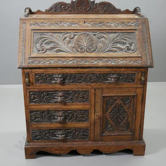 antique mahogany heavily carved drop-front writing desk w/baroque style motifs - lockable, w.key