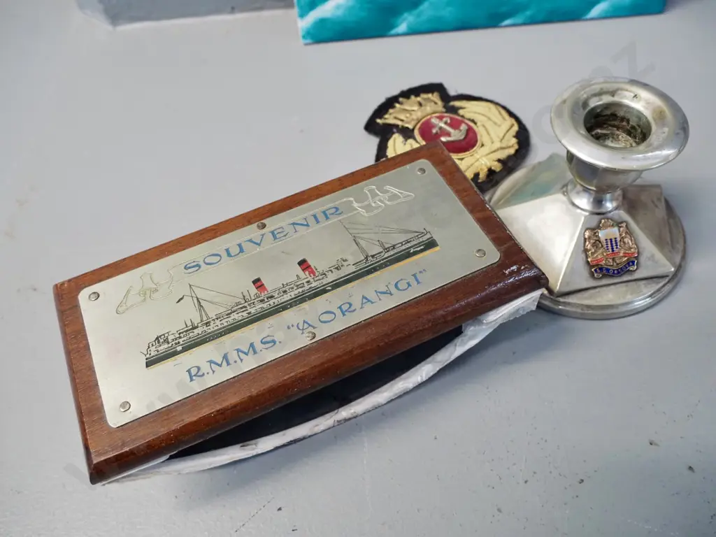 hand-painted Holmdale tile, RMSS Aorangi blotter, silver-plated candlestick with SS Orsova badge and a naval cap badge Image 1++