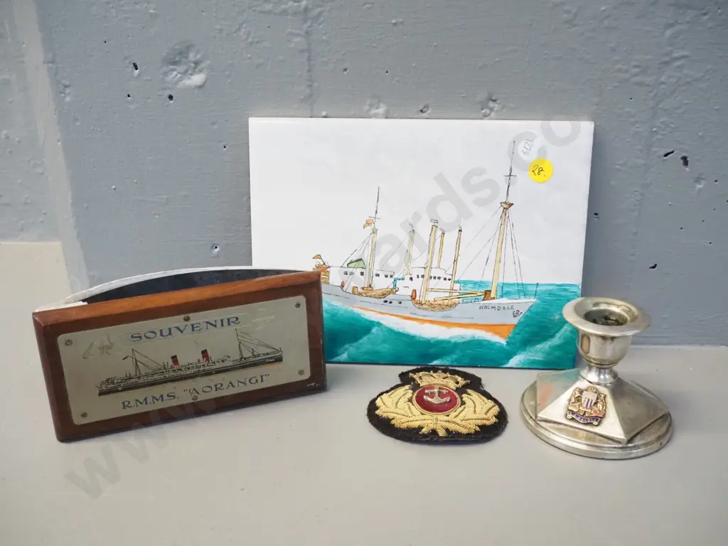 hand-painted Holmdale tile, RMSS Aorangi blotter, silver-plated candlestick with SS Orsova badge and a naval cap badge Image 1++