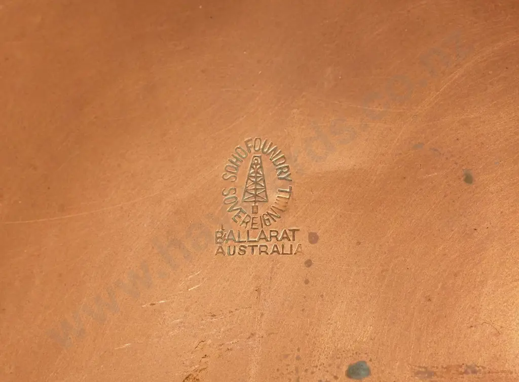 ornamental copper pan, wooden handle has brass collar, pan marked Soho Foundry Ballarat L-610 Pan D-270 Image 1++