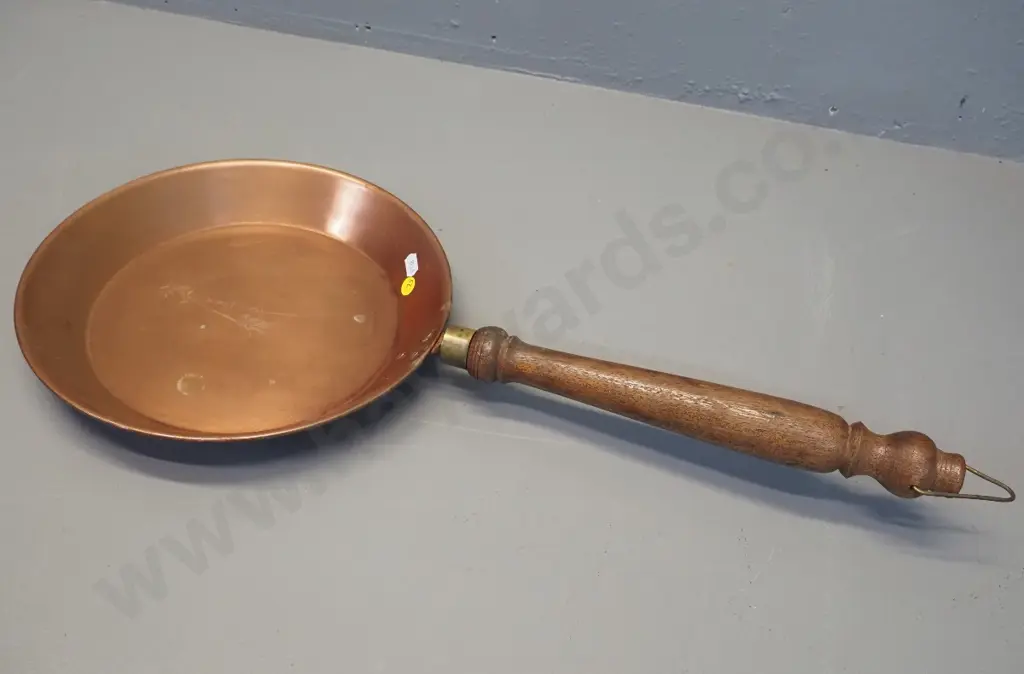 ornamental copper pan, wooden handle has brass collar, pan marked Soho Foundry Ballarat L-610 Pan D-270 Image 1++