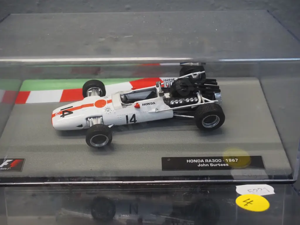 2 die-cast 1:43 scale Formula 1 racing cars - 1964 Lorenzo Bandini and 1967 John Surtees Image 1++