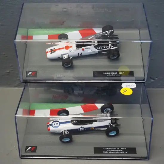2 die-cast 1:43 scale Formula 1 racing cars - 1964 Lorenzo Bandini and 1967 John Surtees