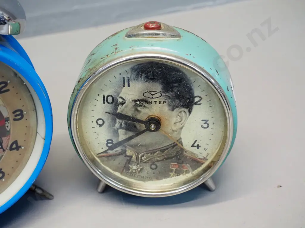 2 retro political themed wind-up alarm clocks - Stalin and Mao - working condition unknown, paint chips etc. Mao H-180 Image 1++