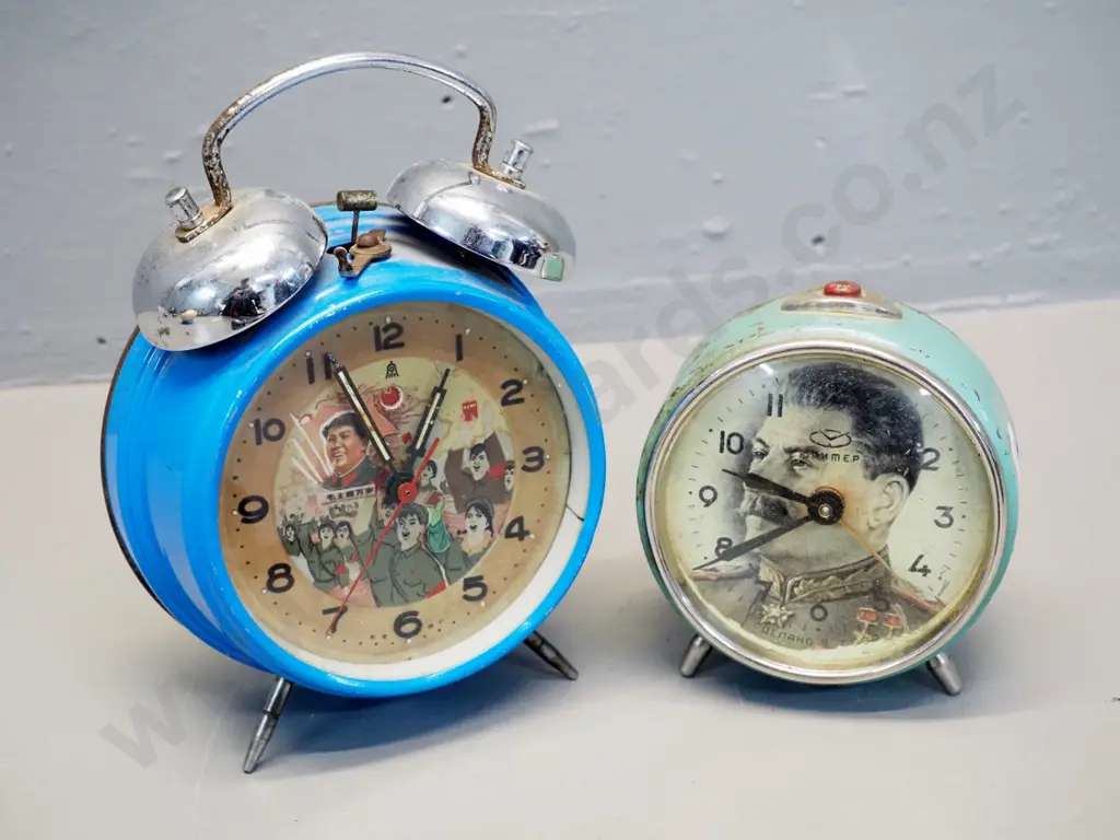 2 retro political themed wind-up alarm clocks - Stalin and Mao - working condition unknown, paint chips etc. Mao H-180 Image 1++