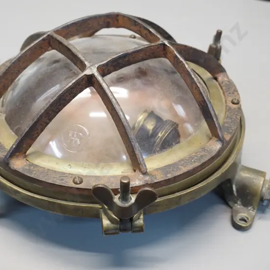 vintage cast brass cased light fitting with convex glass cover, cast iron grille - marked FR. Diameter 260 D-120