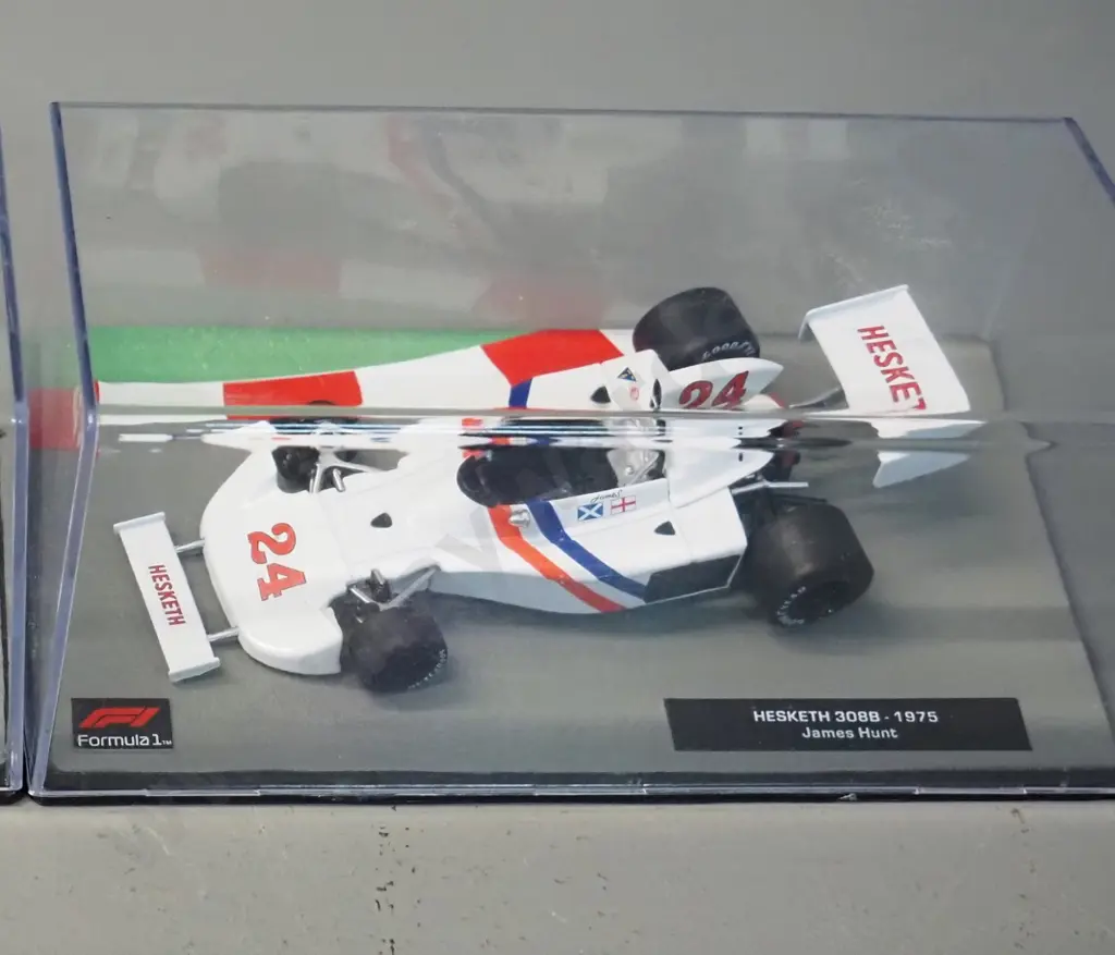 2 die-cast 1:43 scale Formula 1 racing cars - both 1975 - Vittorio Brambilla and James Hunt Image 1++