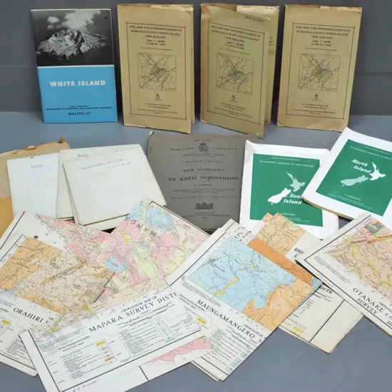 assorted New Zealand geological maps, White Island booklet, etc.