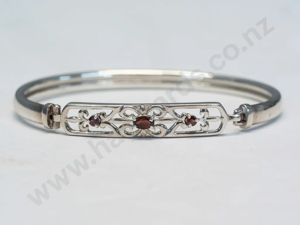 silver bangle with 3 garnets Image 1++