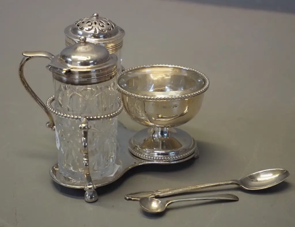 sterling silver condiment set w/hallmarks and Thomas, Bond St. on base, glass liner for salt, chips to bases of other 2 Image 1++