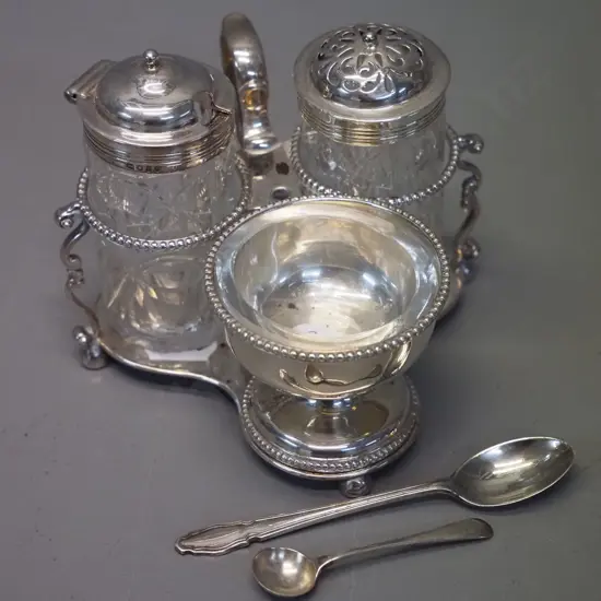 sterling silver condiment set w/hallmarks and Thomas, Bond St. on base, glass liner for salt, chips to bases of other 2