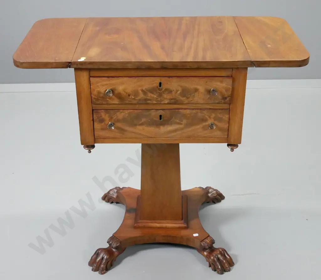 antique mahogany work table with drop-leaf ends, flame veneer drawer fronts, square pedestal base with claw feet Image 1++