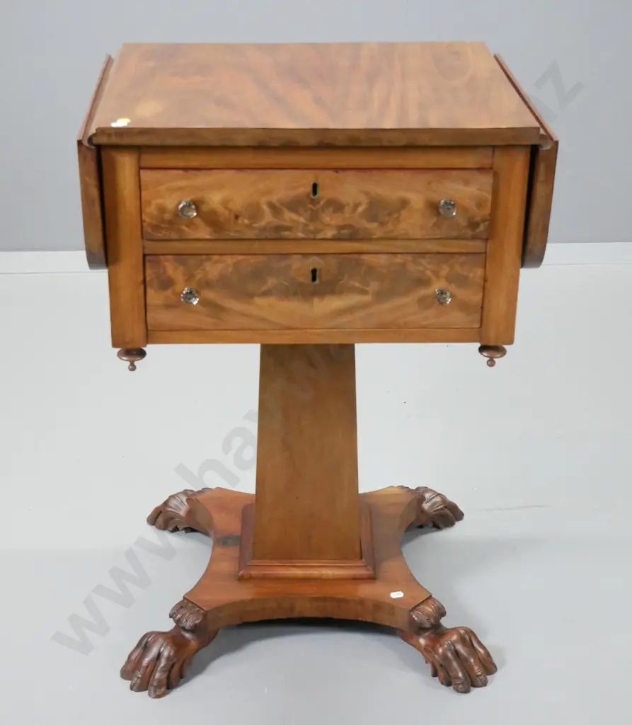 antique mahogany work table with drop-leaf ends, flame veneer drawer fronts, square pedestal base with claw feet Image 1++