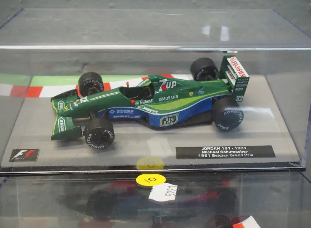 2 die-cast 1:43 scale Formula 1 racing cars - 1991 Michael Schumacher and Ayrton Senna Image 1++