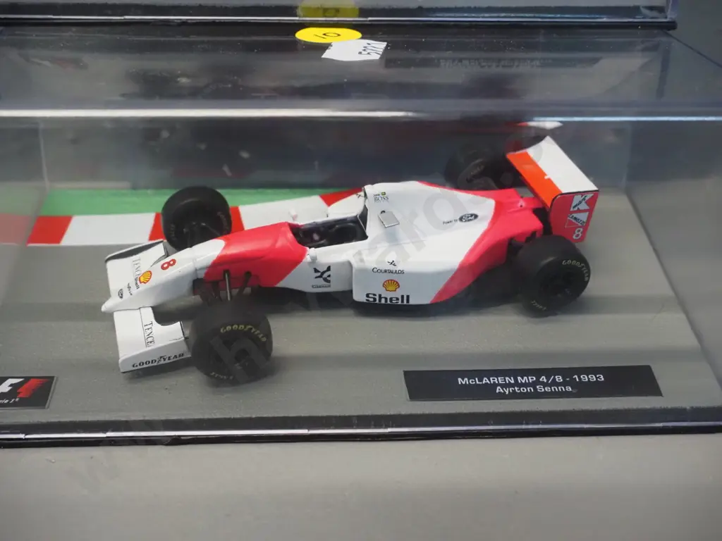 2 die-cast 1:43 scale Formula 1 racing cars - 1991 Michael Schumacher and Ayrton Senna Image 1++